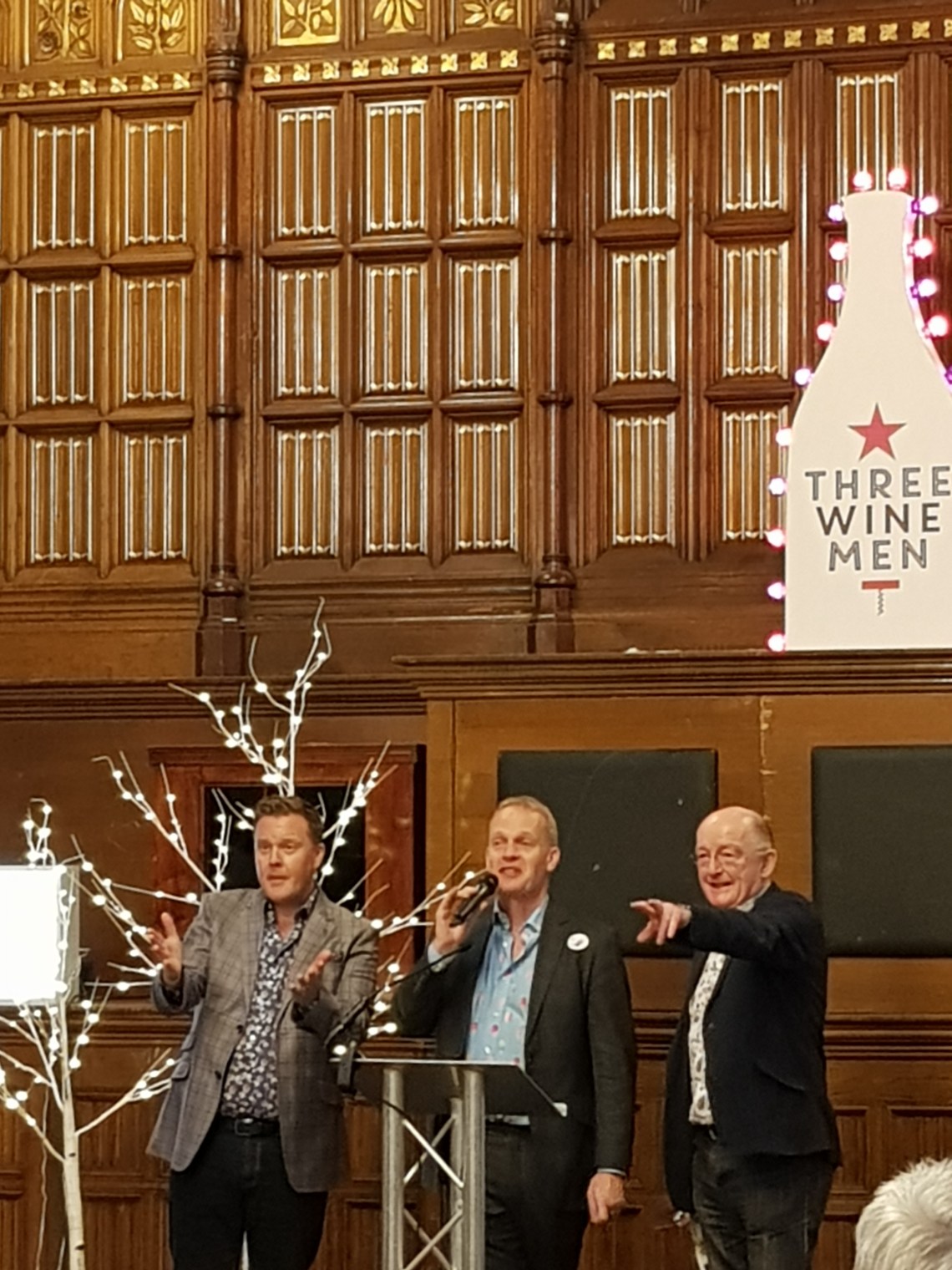The 3 wine men on stage